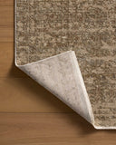 A power-loomed polyester area rug featuring traditional and distressed design and calming sage and sandy tones, the Haywood HYD-01 Sage / Sand Area Rug adds character to any room