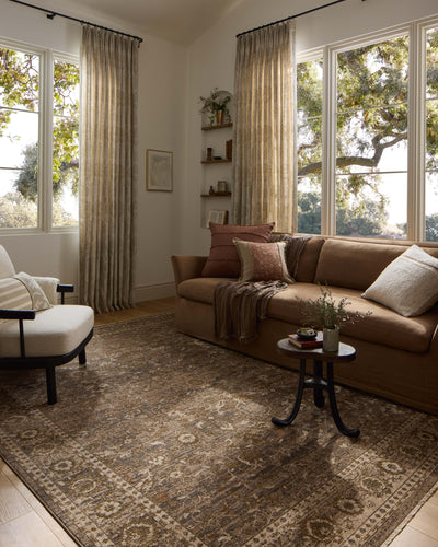 Rich in subtle pebble and deep charcoal hues with traditional and distressed detail, the Haywood HYD-02 Pebble / Charcoal Area Rug is a power-loomed polyester area rug built for style and comfort