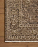 Rich in subtle pebble and deep charcoal hues with traditional and distressed detail, the Haywood HYD-02 Pebble / Charcoal Area Rug is a power-loomed polyester area rug built for style and comfort