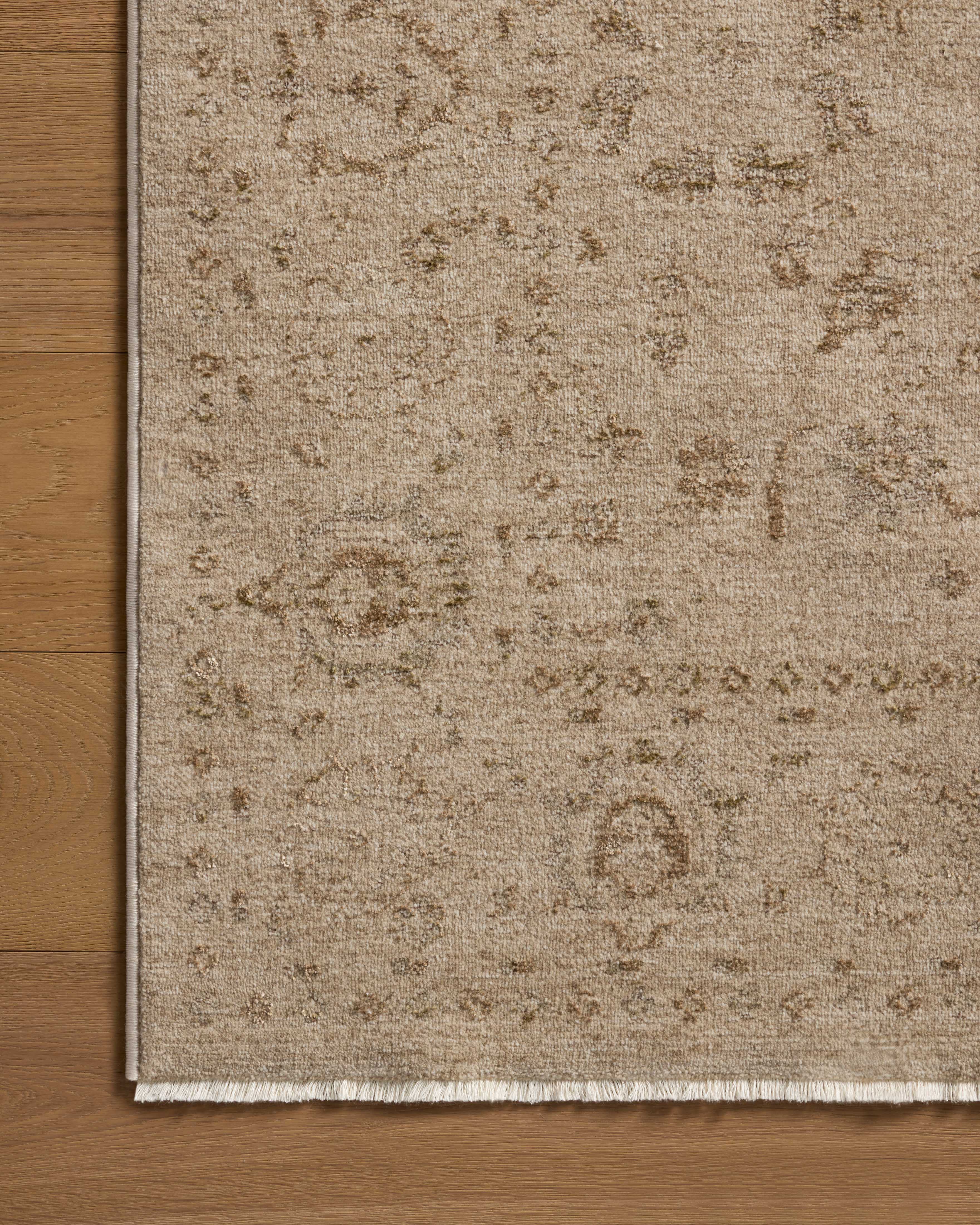 The Haywood HYD-02 Sand / Natural Area Rug offers sandy and warm natural sophistication and traditional and distressed charm in a power-loomed polyester area rug