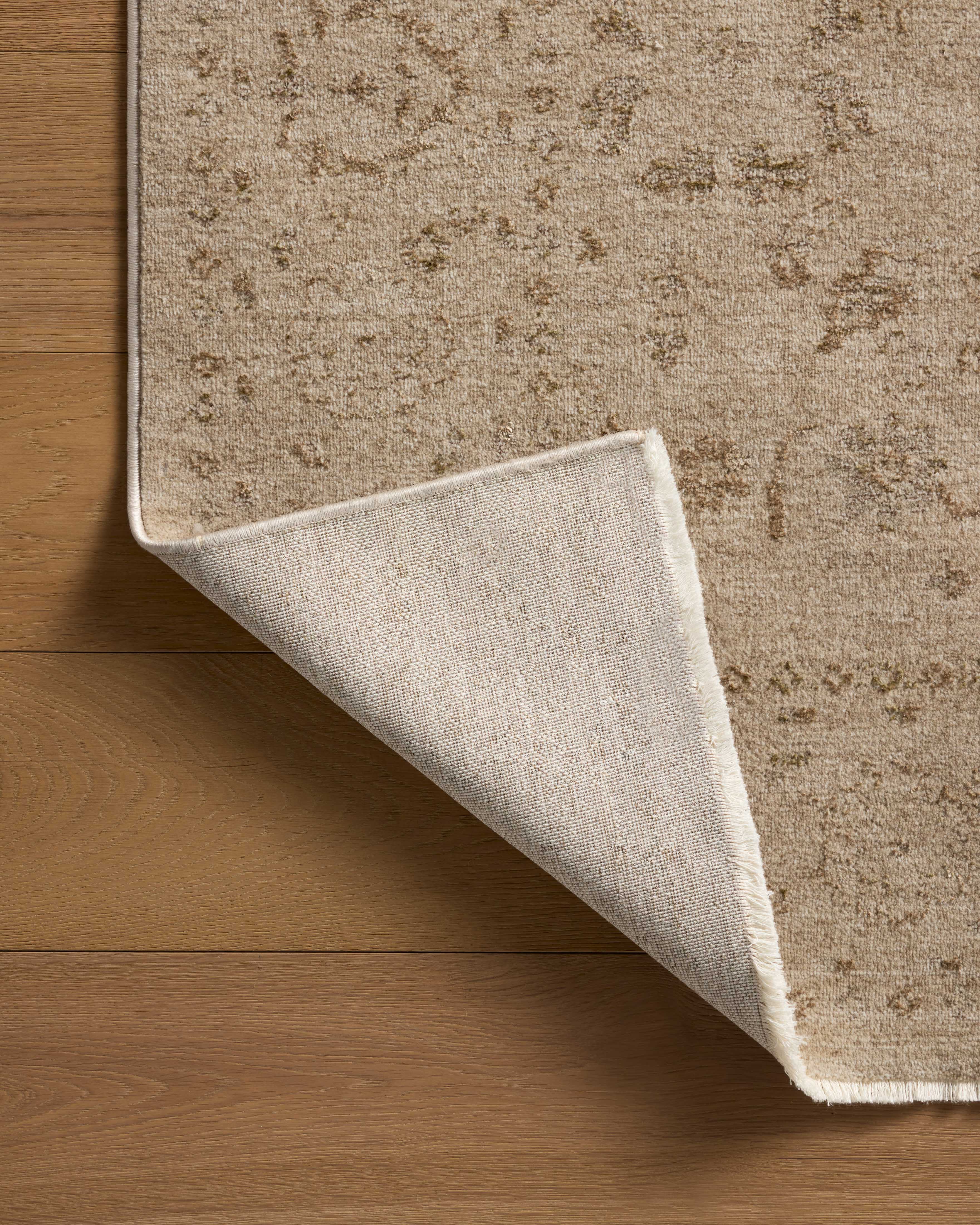 The Haywood HYD-02 Sand / Natural Area Rug offers sandy and warm natural sophistication and traditional and distressed charm in a power-loomed polyester area rug