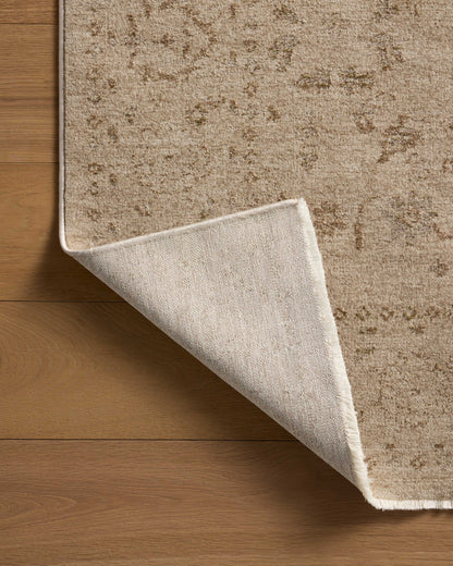 The Haywood HYD-02 Sand / Natural Area Rug offers sandy and warm natural sophistication and traditional and distressed charm in a power-loomed polyester area rug