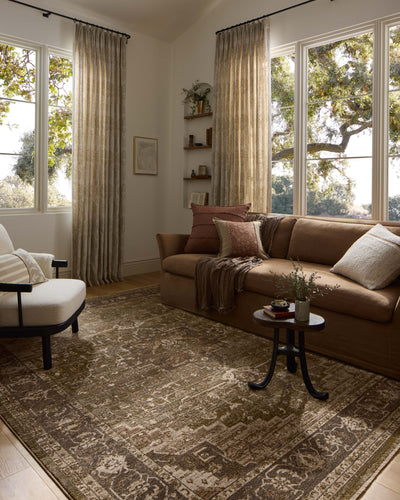 The Haywood HYD-03 Moss / Charcoal Area Rug brings lush moss and deep charcoal character and traditional and distressed flair to your home in a power-loomed polyester area rug