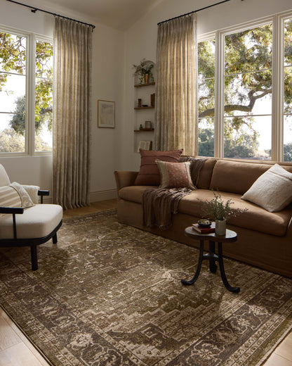 The Haywood HYD-03 Moss / Charcoal Area Rug brings lush moss and deep charcoal character and traditional and distressed flair to your home in a power-loomed polyester area rug