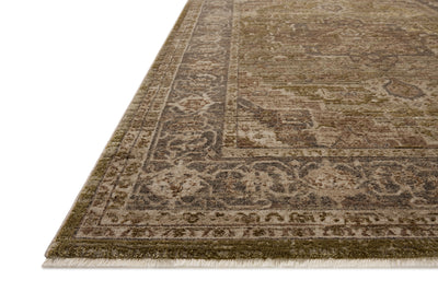 The Haywood HYD-03 Moss / Charcoal Area Rug brings lush moss and deep charcoal character and traditional and distressed flair to your home in a power-loomed polyester area rug