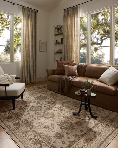 A power-loomed polyester area rug with traditional and distressed design in refined ivory and versatile taupe hues, the Haywood HYD-04 Ivory / Taupe Area Rug is a standout in any décor