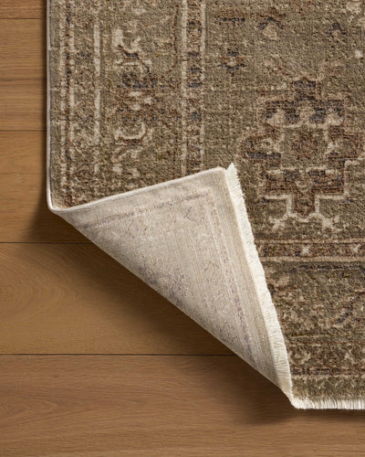 The Haywood HYD-04 Sage / Earth Area Rug highlights calming sage and earthy tones and traditional and distressed texture in a beautifully made power-loomed polyester area rug