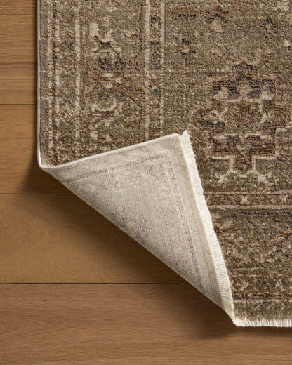 The Haywood HYD-04 Sage / Earth Area Rug highlights calming sage and earthy tones and traditional and distressed texture in a beautifully made power-loomed polyester area rug