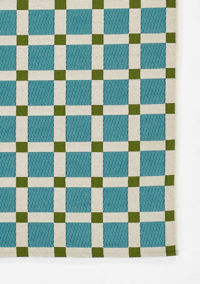 Icon ICN-1 Blue Area Rug from Novogratz x Momeni Icon collection—blue-and-white checker with olive accents.