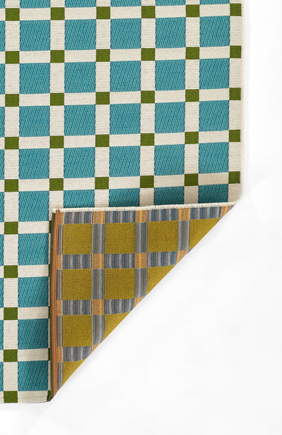 Icon ICN-1 Blue Area Rug from Novogratz x Momeni Icon Collection—Mid-Century-inspired blue plaid with olive accents.