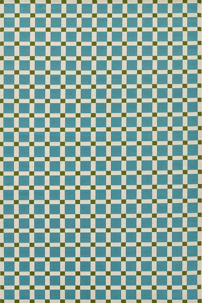 Icon ICN-1 Blue Area Rug from Novogratz x Momeni Icon Collection featuring a blue and olive checkered grid pattern.