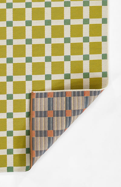 Icon ICN-1 Green Area Rug by Novogratz x Momeni, bold Mid-Century Modern geometric pattern in green and mustard.