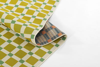 Icon ICN-1 Green Area Rug with a bold yellow and green plaid geometric pattern.
