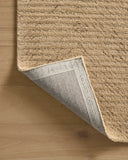 The Kai KAI-01 Beige Area Rug brings warm beige character and ribbed flair to your home in a hand-tufted wool area rug