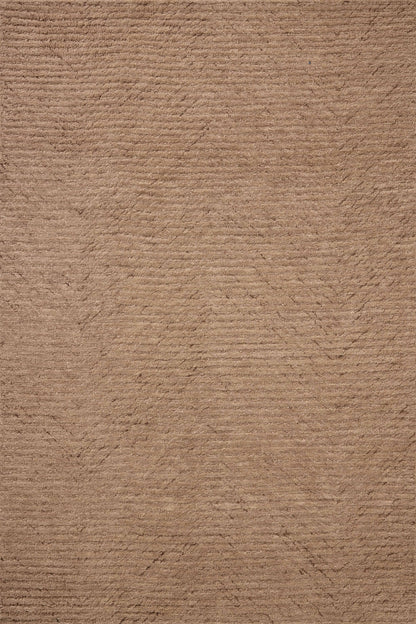 Finished in delicate blush tones with ribbed styling, the Kai KAI-01 Blush Area Rug is a hand-tufted wool area rug for modern living