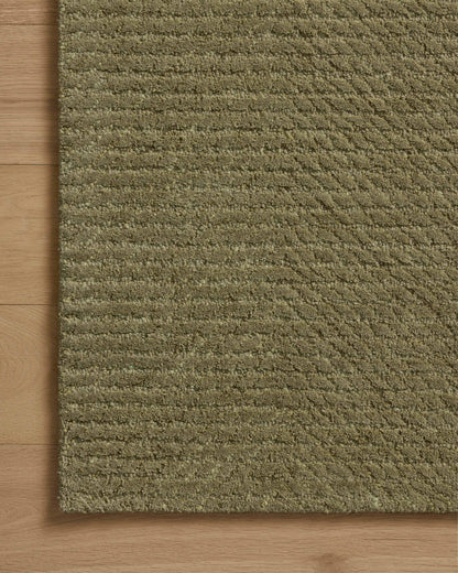 A hand-tufted wool area rug with ribbed design in earthy olive hues, the Kai KAI-01 Olive Area Rug is a standout in any décor