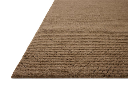 The Kai KAI-01 Pebble Area Rug highlights subtle pebble tones and ribbed texture in a beautifully made hand-tufted wool area rug