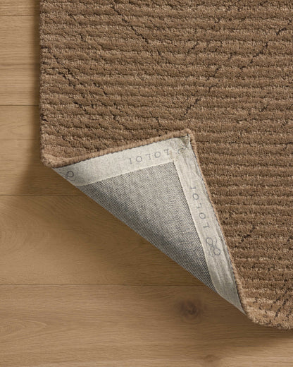 The Kai KAI-01 Pebble Area Rug highlights subtle pebble tones and ribbed texture in a beautifully made hand-tufted wool area rug