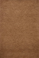 Dressed in rich terracotta hues with ribbed detail, the Kai KAI-01 Terracotta Area Rug is a hand-tufted wool area rug that completes any room