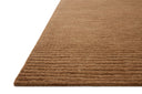 Dressed in rich terracotta hues with ribbed detail, the Kai KAI-01 Terracotta Area Rug is a hand-tufted wool area rug that completes any room