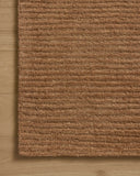 Dressed in rich terracotta hues with ribbed detail, the Kai KAI-01 Terracotta Area Rug is a hand-tufted wool area rug that completes any room