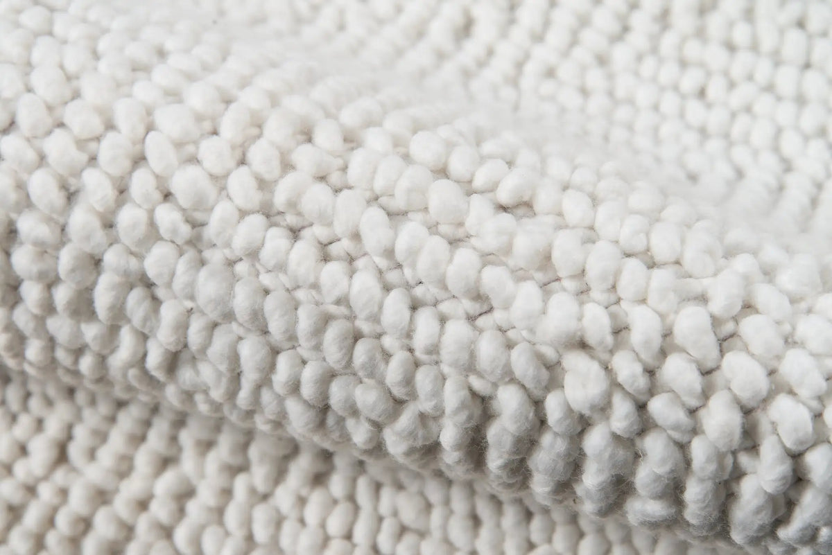 Close-up texture of the Erin Gates by Momeni Ledgebrook LED-1 ivory area rug showcasing its hand-woven structured stripe pattern and low-profile design.
