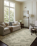 Crafted as a hand-tufted wool area rug, the Lenore LNO-01 Ivory / Sky Area Rug brings refined ivory and breezy sky-blue warmth and floral character to your space