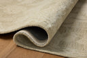 With calming sage and warm natural hues and floral styling, the Lenore LNO-01 Sage / Natural Area Rug is a hand-tufted wool area rug that elevates any room
