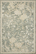 The Lenore LNO-02 Lagoon / Wheat Area Rug blends tranquil lagoon and golden wheat tones and floral motifs into a hand-tufted wool area rug with timeless appeal