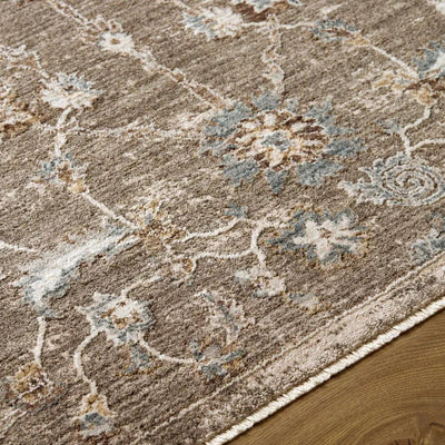Close-up of the Arda ACZ-2300 medium gray area rug showing its floral pattern and fringe detail.