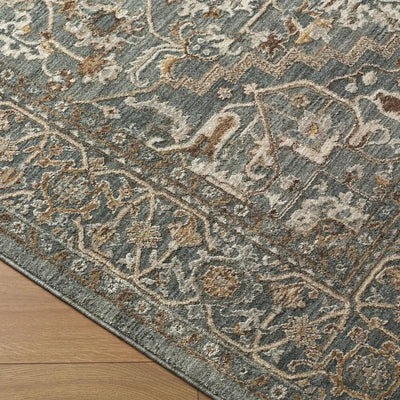 Close-up of the Arda ACZ-2306 Deep Teal Area Rug featuring a traditional floral pattern on a wooden floor.