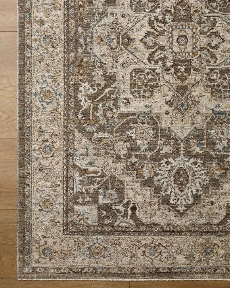 Overhead view of the Arda ACZ-2308 Taupe Area Rug with a traditional medallion pattern and fringe.