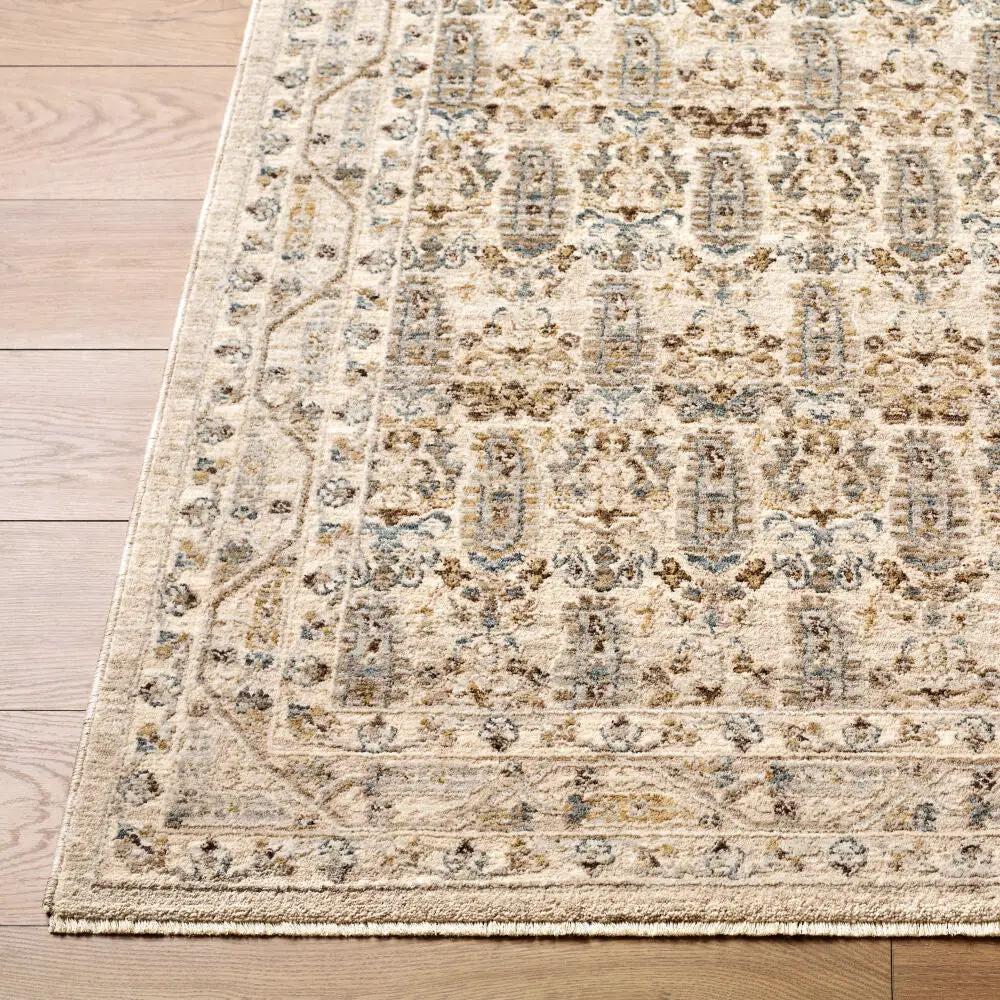 Close-up of the Arda ACZ-2310 medium gray area rug with an intricate pattern and fringe edge.