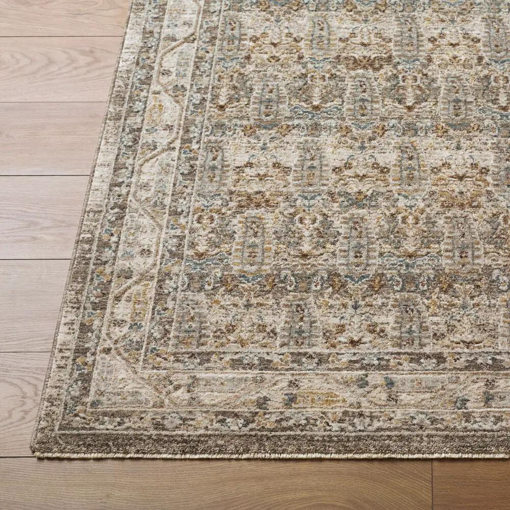 Close-up of the Arda ACZ-2312 Medium Gray Area Rug with an intricate traditional pattern and fringe.
