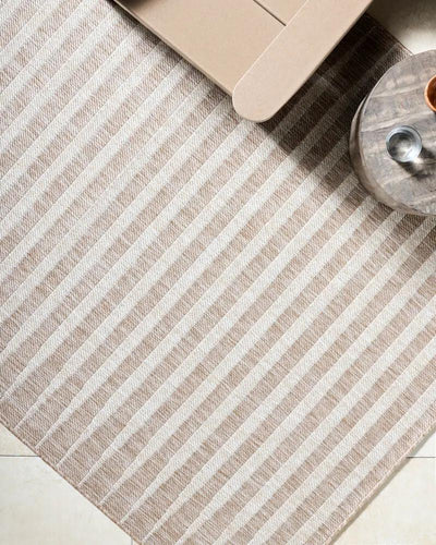 Overhead view of the Agave GAAG-2300 Tan Area Rug featuring a neutral striped pattern.
