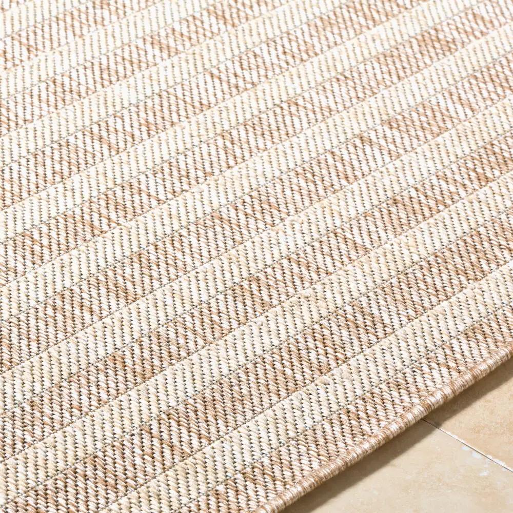 Close-up of the Agave GAAG-2300 Tan Area Rug showing its machine-woven tan and white striped texture.