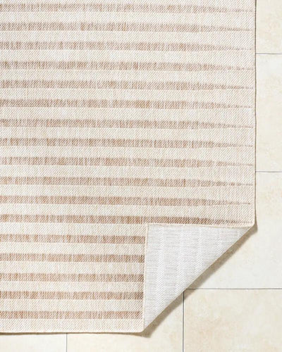 Close-up of the Agave GAAG-2301 Off-White Area Rug with a corner folded over to show the backing.