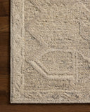 Rich in subtle pebble and soft misty hues with traditional detail, the Mabel MBL-01 Pebble / Mist Area Rug is a hand-tufted wool area rug built for style and comfort