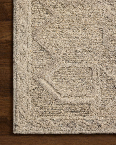 Rich in subtle pebble and soft misty hues with traditional detail, the Mabel MBL-01 Pebble / Mist Area Rug is a hand-tufted wool area rug built for style and comfort