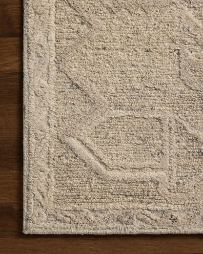 Rich in subtle pebble and soft misty hues with traditional detail, the Mabel MBL-01 Pebble / Mist Area Rug is a hand-tufted wool area rug built for style and comfort