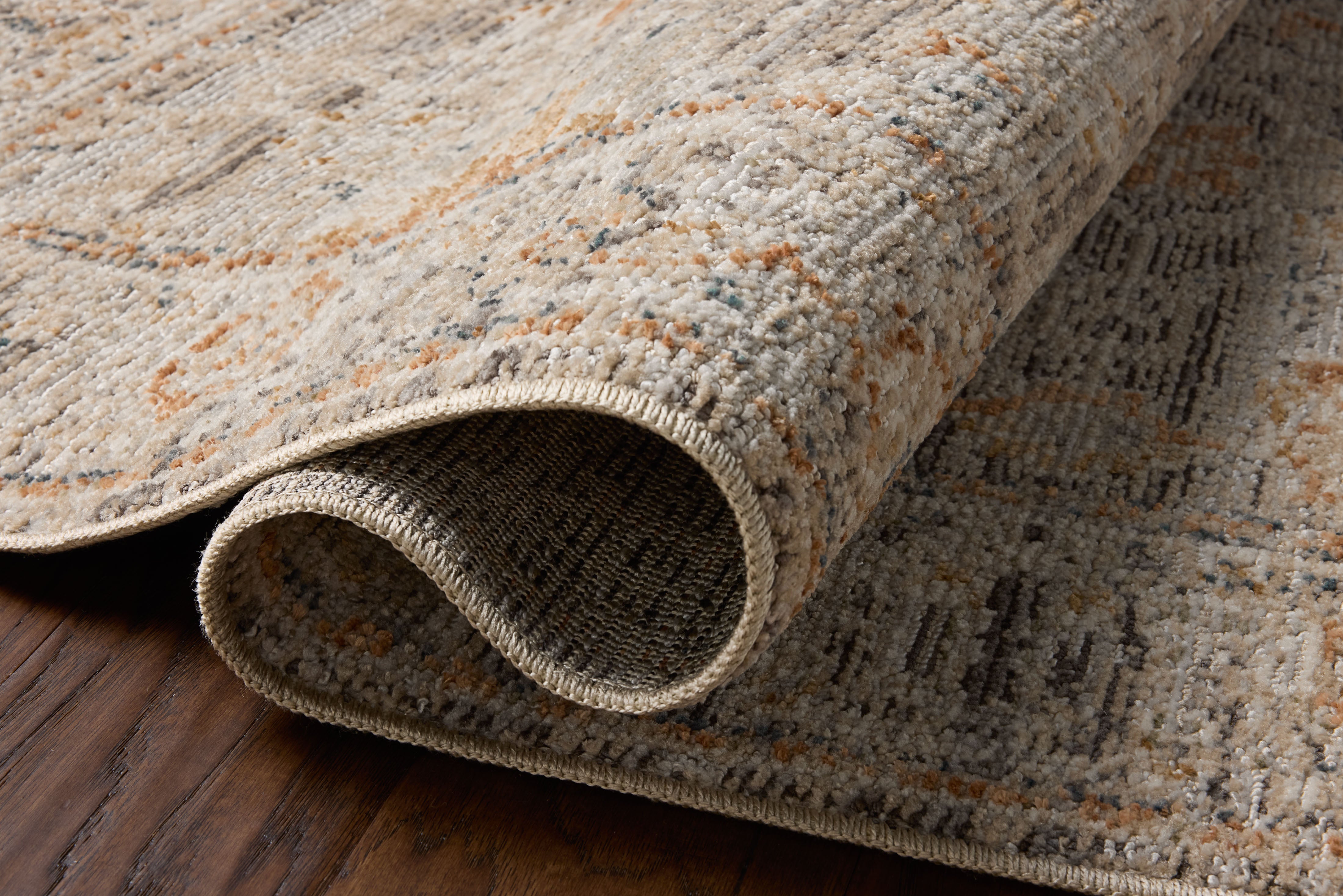 Loloi Milena MLE?05 charcoal and apricot vintage?style area rug with warm accents and classic design