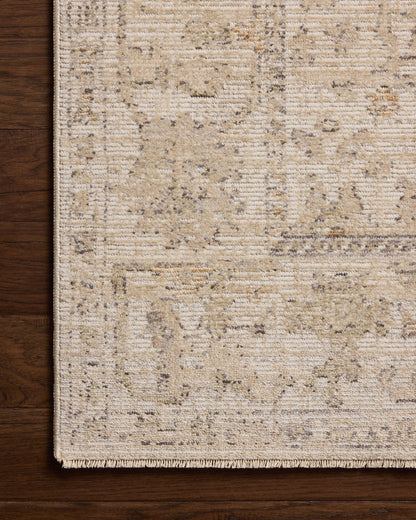 Loloi Milena MLE?08 ivory and sand vintage?inspired area rug with soft neutral tones and textured pattern