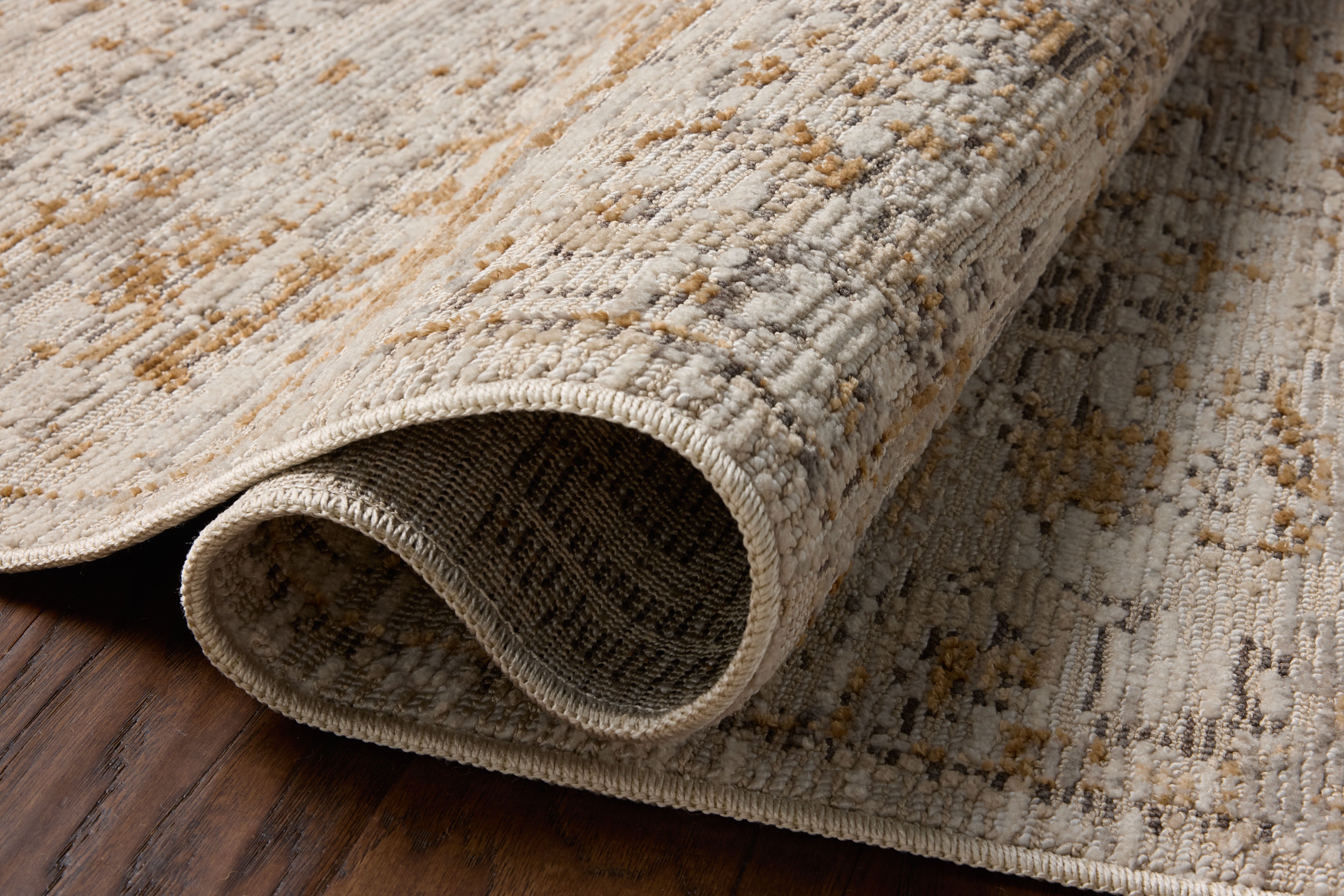 Loloi Milena MLE?09 ivory and ochre vintage area rug with warm accents and classic decorative pattern