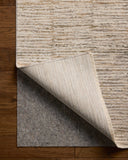 The Nellie NEL-01 Beige / Fog Area Rug showcases warm beige and misty tones in a power-loomed polyester and polypropylene area rug with graphic style
