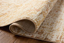 The Nellie NEL-02 Sunset / Pebble Area Rug pairs glowing sunset and subtle pebble tones and graphic patterns in a power-loomed polyester and polypropylene area rug