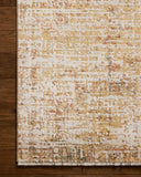 The Nellie NEL-02 Sunset / Pebble Area Rug pairs glowing sunset and subtle pebble tones and graphic patterns in a power-loomed polyester and polypropylene area rug