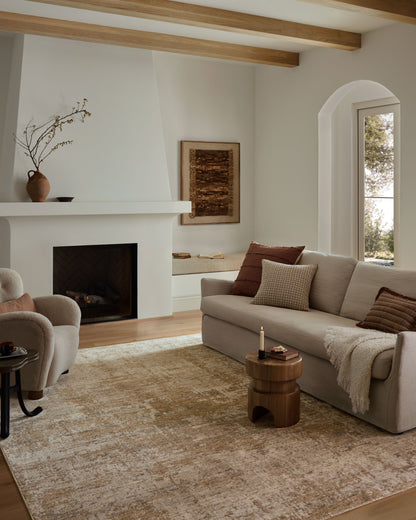 Crafted as a power-loomed polyester and polypropylene area rug, the Nellie NEL-03 Stone / Taupe Area Rug brings grounding stone and versatile taupe warmth and graphic character to your space