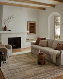 The Nellie NEL-04 Ivory / Pebble Area Rug blends refined ivory and subtle pebble tones and graphic motifs into a power-loomed polyester and polypropylene area rug with timeless appeal