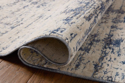The Nellie NEL-05 Dove / Blue Area Rug delivers gentle dove and calming blue beauty and graphic elegance in a power-loomed polyester and polypropylene area rug