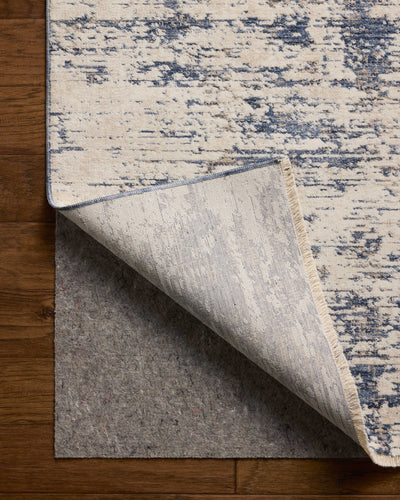 The Nellie NEL-05 Dove / Blue Area Rug delivers gentle dove and calming blue beauty and graphic elegance in a power-loomed polyester and polypropylene area rug